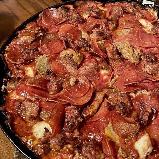 Pequod's Pizza slice with gooey cheese